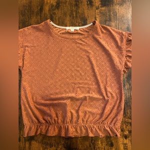 Rewind size small top, rust orange color